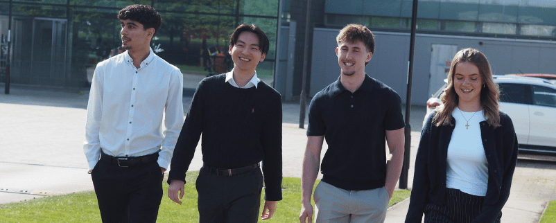 Four year in industry graduates walking together